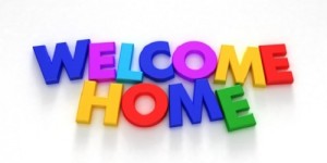 welcome home written in colorful magent letters